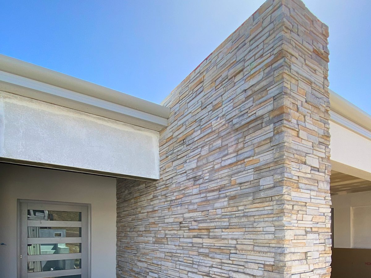 Natural stone cladding feature wall and column on a modern home